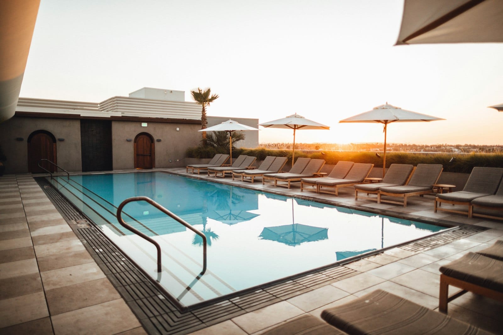 Crystal clear pool water with sunlight refracting on the floor